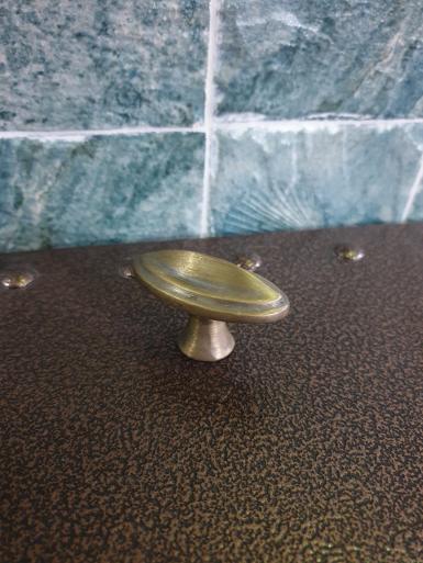 Brass Pull handle Item Code OVAL ELS size long 56 mm wide 27 mm high 38 mm total. base 20 mm.